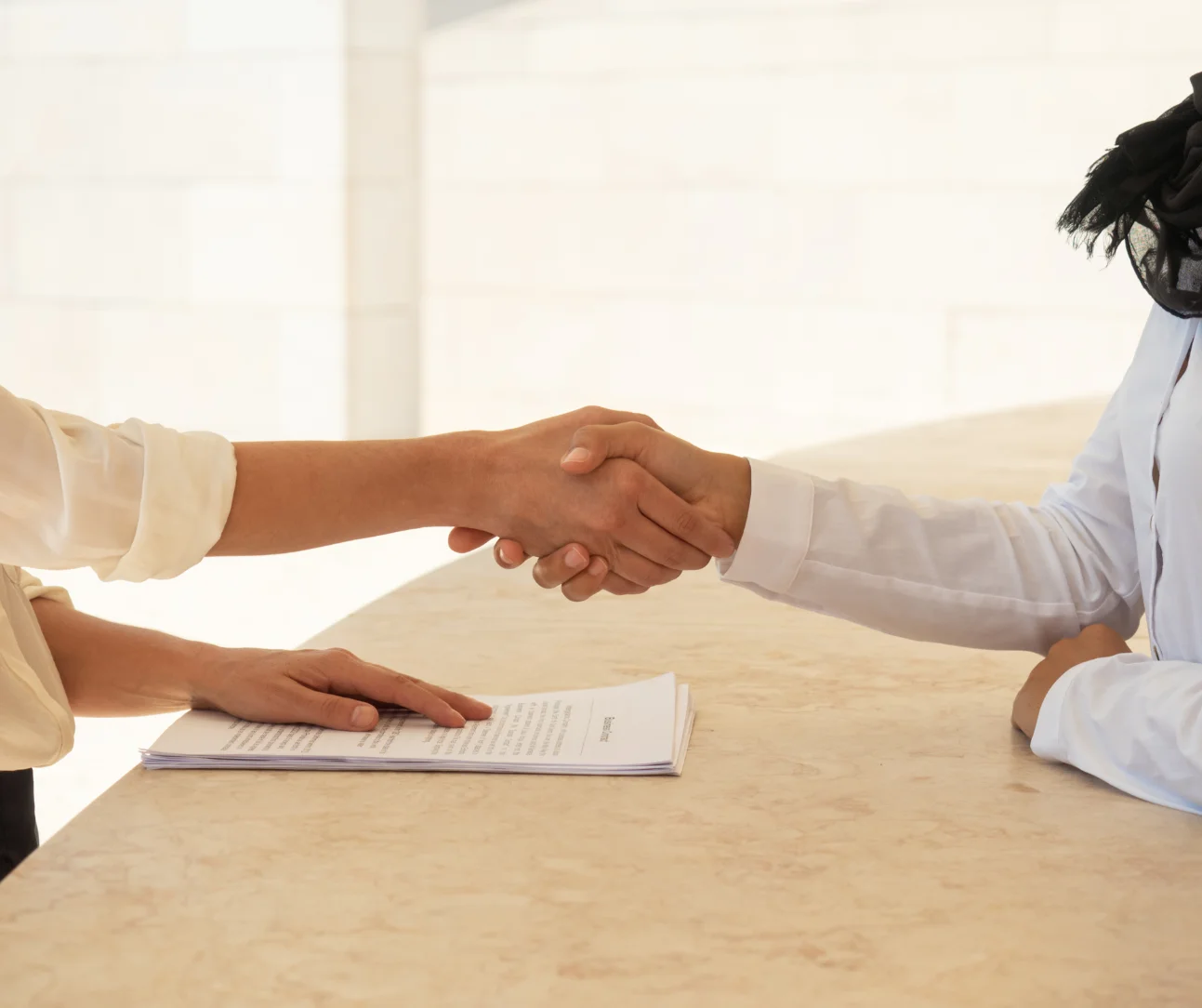 Business partners finalizing a strategic logistics or fulfillment agreement.